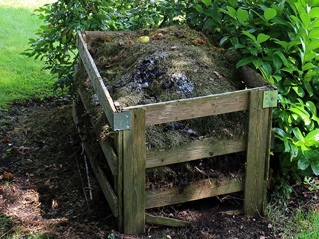 compost heap copy- how to make your garden eco-friendly - garden - goodhomesmagazine.com