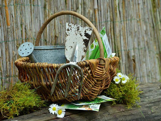 garden tools in vintage basket - win £1,000 worth of garden tools - garden - goodhomesmagazine.com