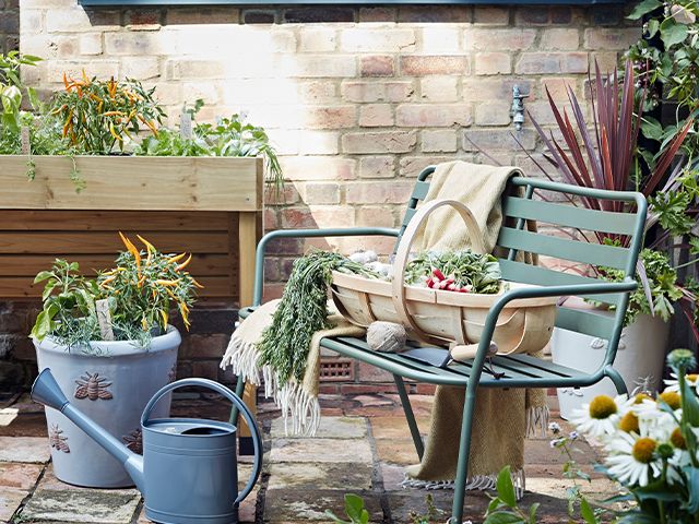 small patio garden - top tips for making a small garden look bigger - garden - goodhomesmagazine.com