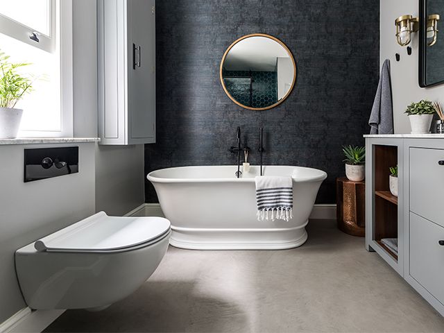 stylish bathroom with freestanding bath - take a look at this stylish family bathroom with statement tiles - bathroom - goodhomesmagazine.com