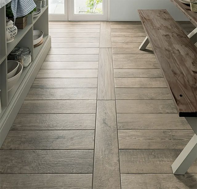 wood kitchen floor with design detail through centre - inspiration - goodhomesmagazine.com 