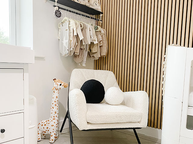 Boucle cream chair in Japandi gender neutral nursery scheme