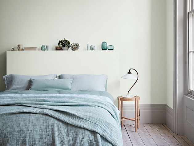 bedroom with bed table and lamp