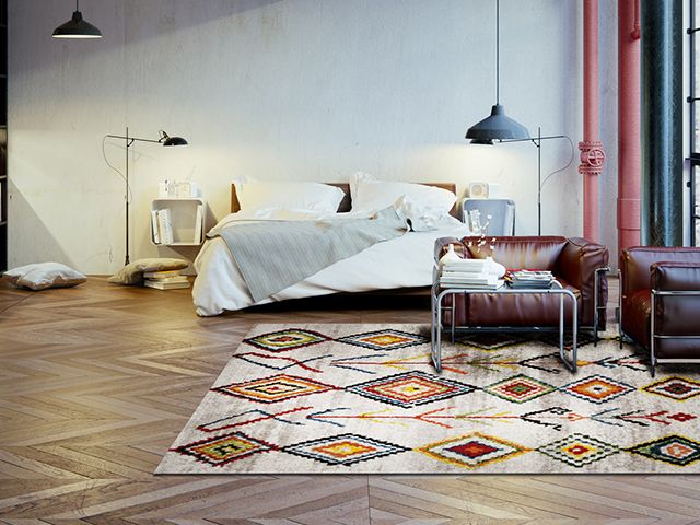 berber style colourful rug - 5 clever and creative ways of using rugs - inspiration - goodhomesmagazine.com