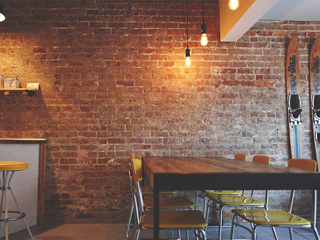 brick wall dining room - how to expose brickwork at home - inspiration - goodhomesmagazine.com