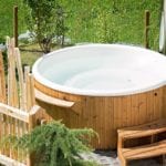 garden hot tub - how to keep your hot tub clean this summer - shopping - goodhomesmagazine.com