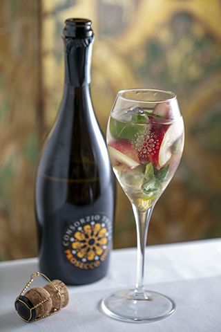 peach bellini - 3 cocktail recipes to celebrate national prosecco day - kitchen - goodhomesmagazine.com