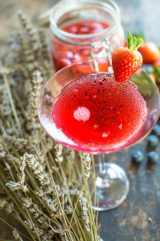 strawberry prosecco cocktail - 3 cocktail recipes to celebrate national prosecco day - kitchen - goodhomesmagazine.com