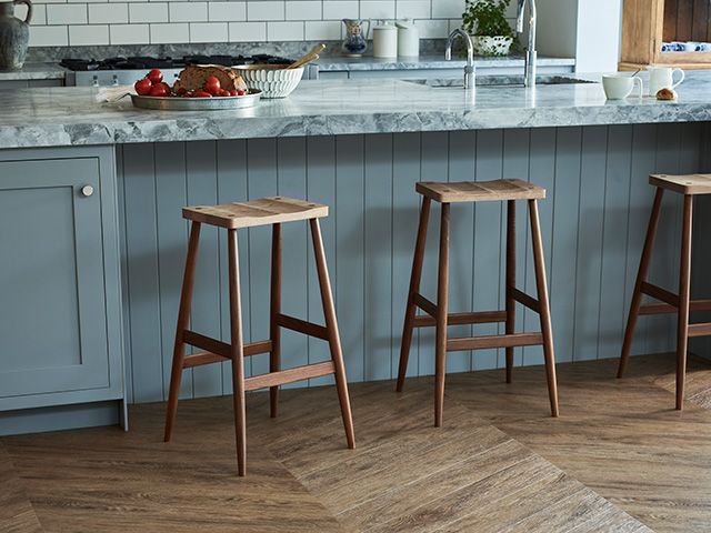 lvt wood effect herringbone floor in kitchen - goodhomesmagazine.com