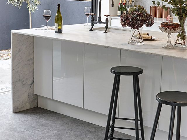 concrete lvt in a modern kitchen - goodhomesmagazine.com