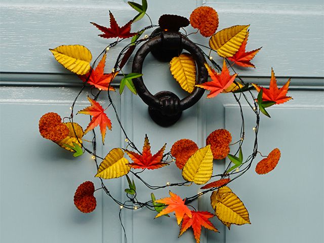 autumnal light up wreath - 5 autumn wreaths for a stylish front door - inspiration - goodhomesmagazine.com