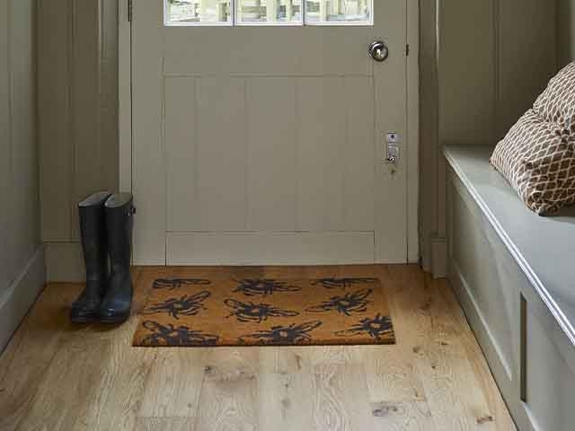 bee print door mat - 6 decorating tips for a durable hallway - hallways - goodhomesmagazine.com