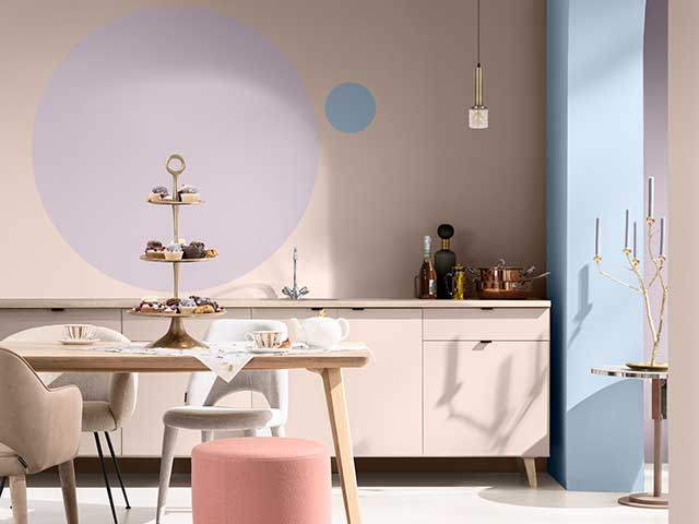 Dulux colour of the year in blue kitchen setting with cake stand on wooden table