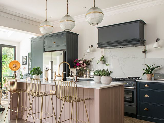 pink kitchen with pendant lighting by colin poole - goodhomesmagazine.com