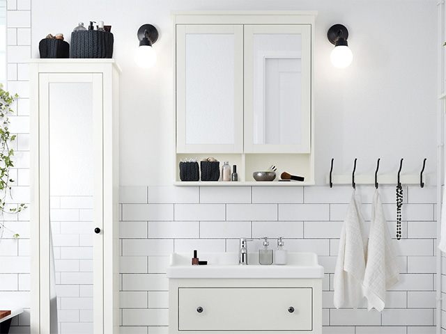ikea storage mirror in a white bathroom - goodhomesmagazine.com