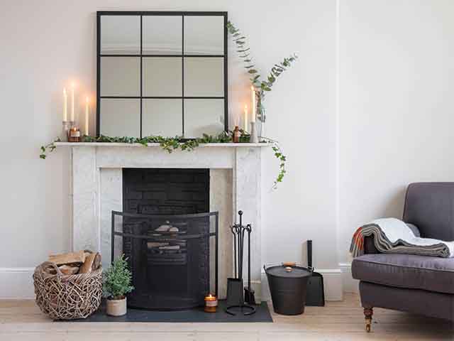 marble fireplace autumnal setting - fireplace design ideas for a cosy home - living room - goodhomesmagazine.com