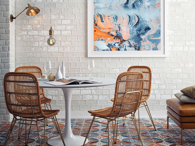 mid century dining space - 5 creative orange decorating ideas - inspiration - goodhomesmagazine.com