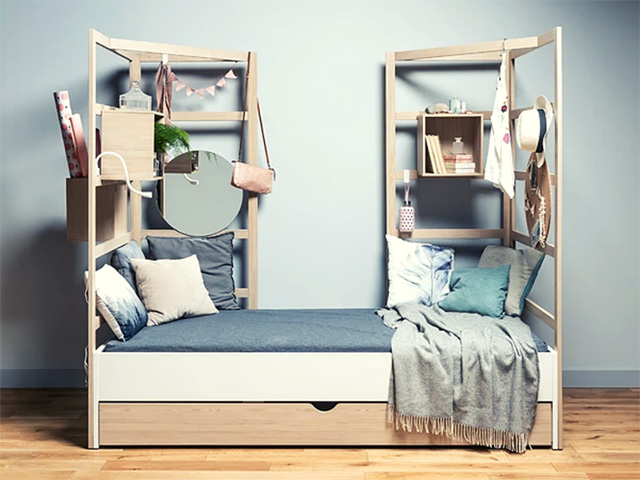 bedroom with trundle bed with shelving storage - kids bedroom - goodhomesmagazine.com