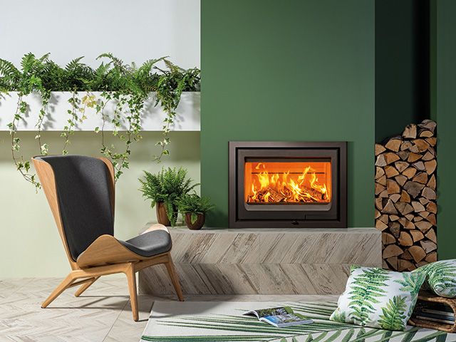 A modern fireplace design with raised hearth - living room - goodhomesmagazine.com