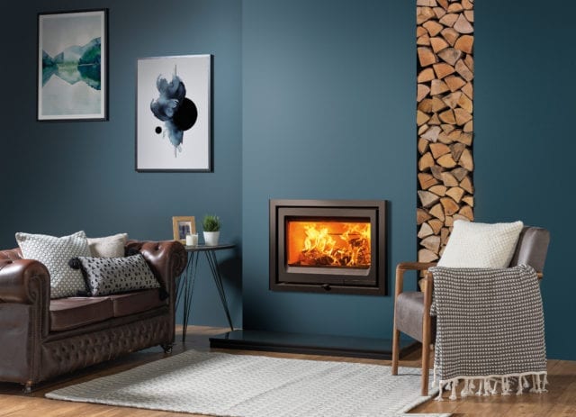 Inset wood burner in a blue living room