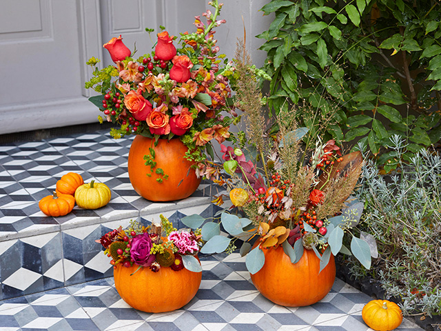 Pumpkin turned into a vases for flowers - goodhomesmagazine.com - halloween pumpkin ideas