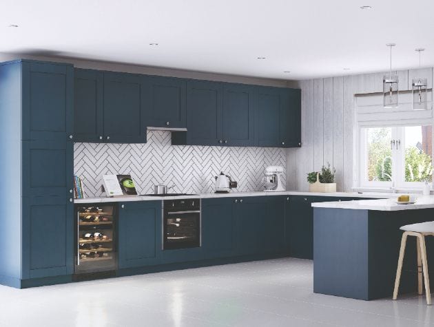 blue shaker style kitchen with integrated appliances