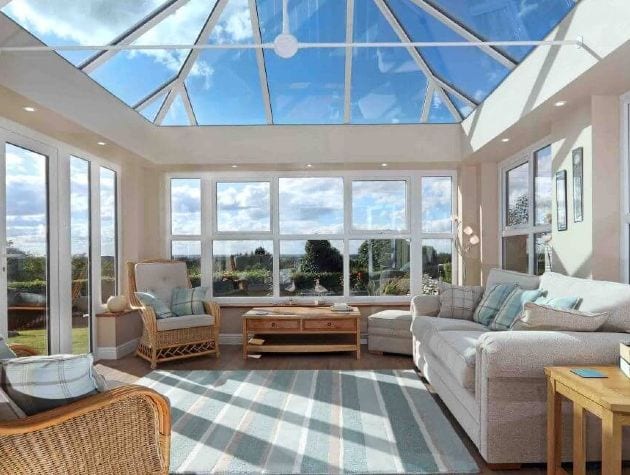 interior of large conservatory with glass roof