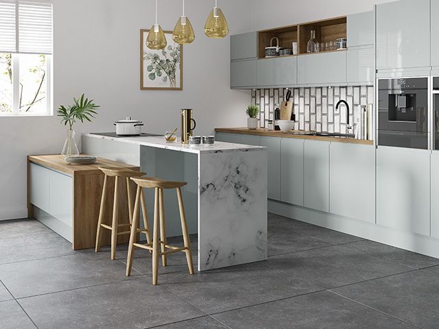 marble kitchen breakfast bar with wooden cabinet and granite flooring tiles