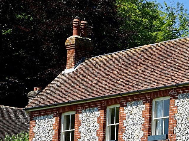 old home with chimney stack - living room - goodhomesmagazine.com