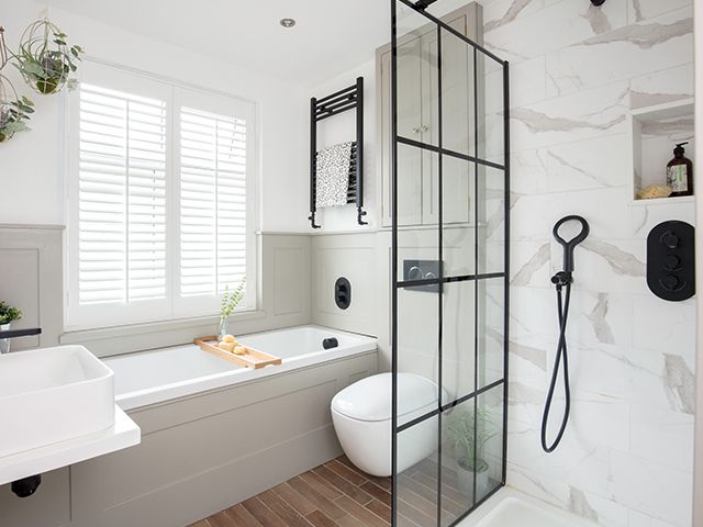 panelled bathroom with built-in bath - goodhomesmagazine.com