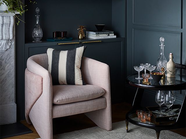 pink accent chair with bar cart - 6 styling ideas for filling an empty corner - inspiration - goodhomesmagazine.com