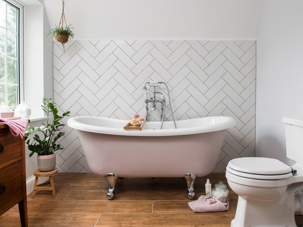 pink freestanding bath in bathroom - goodhomesmagazine.com