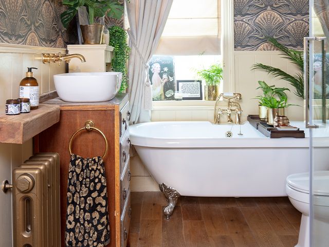 vintage inspired bathroom - explore this eclectic pink victorian home - home tours - goodhomesmagazine.com