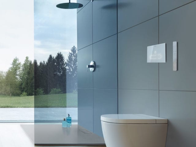 modern bathroom with walk-in shower and floating toilet