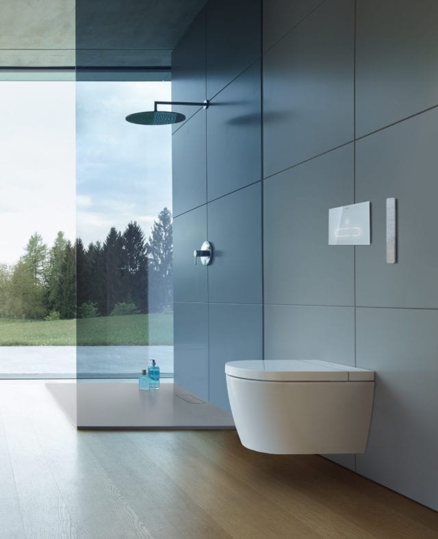 modern bathroom with walk-in shower and floating toilet