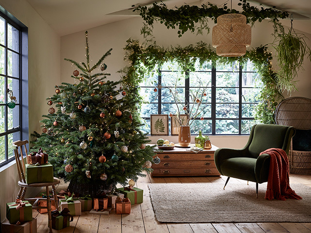 dobbies enchanted forest christmas living room - goodhomesmagazine.com