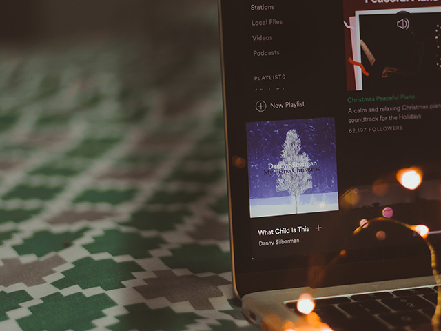 christmas playlist on laptop