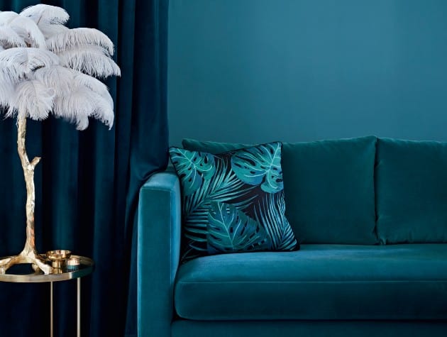 sofa wall and curtain in different shades of blue