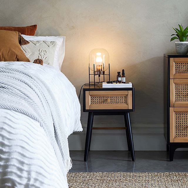 rattan bedside table - japandi interiors trend - goodhomesmagazine.com