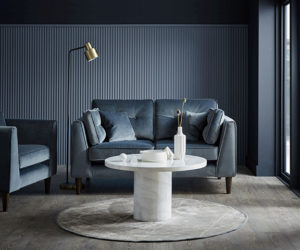 blue living room with textured wall panelling - goodhomesmagazine.com