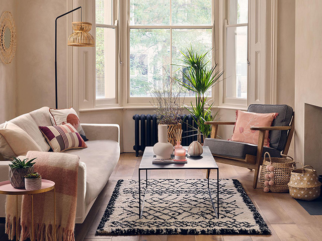 neutral living room with bauhaus painted walls - goodhomesmagazine.com