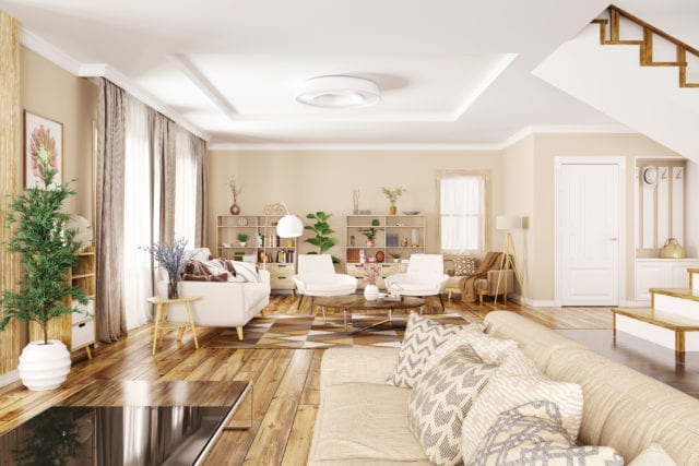 open plan room in house with wooden floor, sodas, chairs and lamps