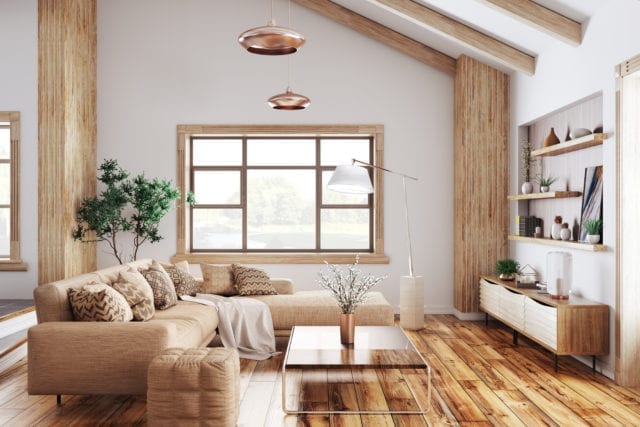 sitting area with l-shaped sofa, wooden floor and shelves