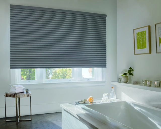 contemporary white bathroom with grey metallic Sonnette™ window shades