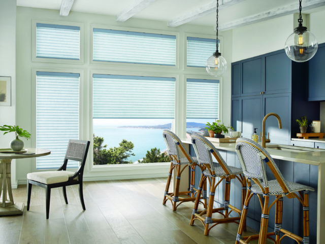 contemporary navy blue kitchen with wooden stools, panoramic windows and Sonnette™ window shades