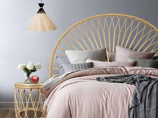 Adeline headboard with pink fabric duvet and side table, goodhomesmagazine.com