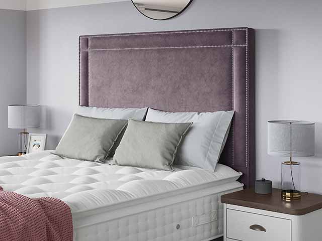 Mauve fabric headboard with stripped mattress, bensons for beds, goodhomesmagazine.com