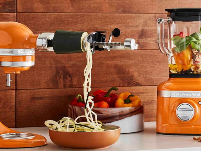 kitchenaid honey blender and artisan mixer in a wood and tile kitchen - goodhomesmagazine.com