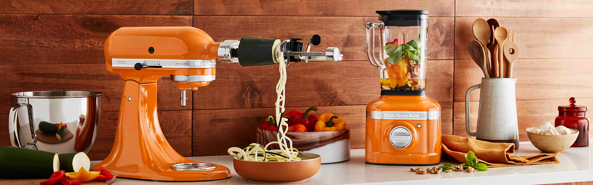 kitchenaid honey blender and artisan mixer in a wood and tile kitchen - goodhomesmagazine.com