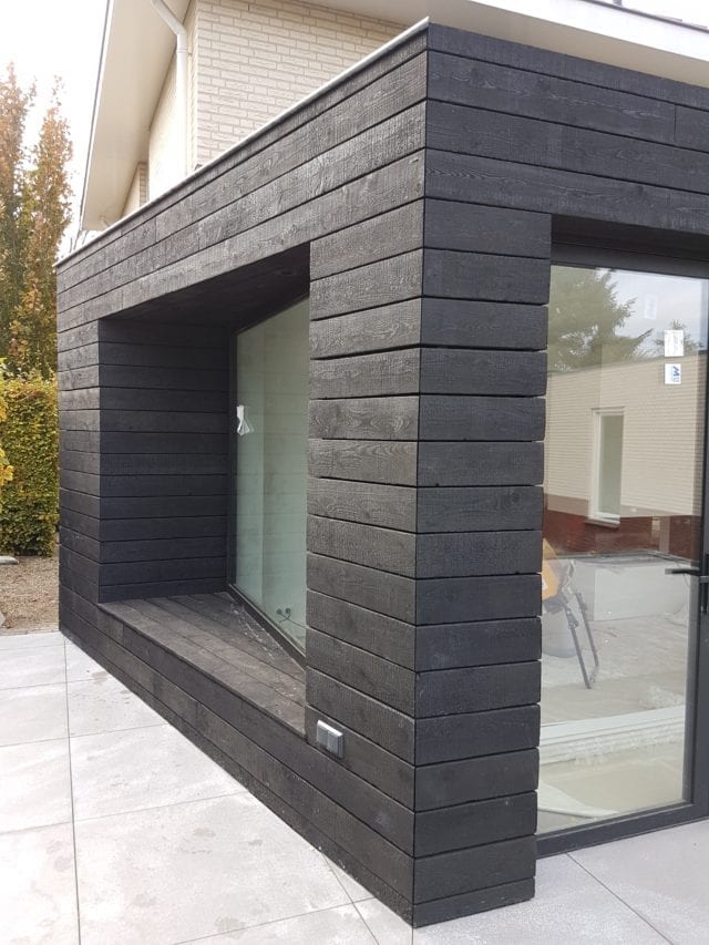 Timber Focus black textured charred Siberian larch cladding on exterior of modern home